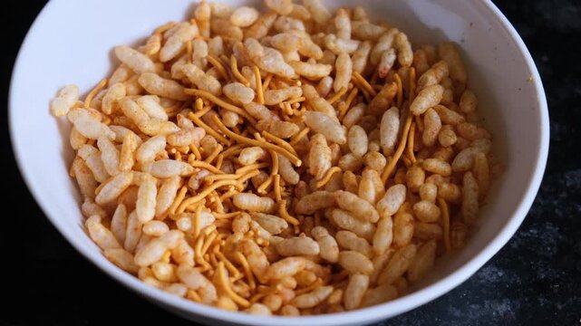 Spiced Puffed Rice and Sev Namkeen in White Bowl