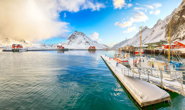 Breathtaking winter sunrise over Ramberg village and harbour.