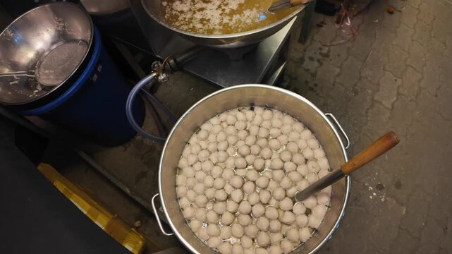 Boiling Thai Fish Balls in Pot Street Food Cooking Process Close-Up, 4K