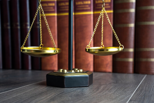 Scales of justice, symbolizing fairness, balance, and impartiality in legal decisions and the judicial system.