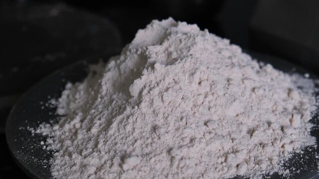 Close up of a pile of fresh white wheat flour on a plate