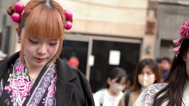 Two Young Japanese Women in Traditional Kimono Walking on Harajuku Street