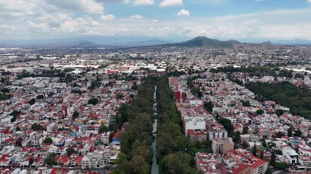 Backwards drone shot of mexico city historical rivers and canals