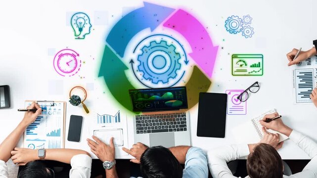Collaborative Business Meeting with Diverse Hands Analyzing Data Strategies, Visual Graphs, and Workflow Innovations on Modern Technology Desk Setup Sigmoid
