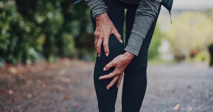 Person, hands and runner with knee pain in nature for workout accident, injury or arthritis. Senior, athlete or sore bone with leg or joint inflammation for fibromyalgia, muscle tension or tendinitis