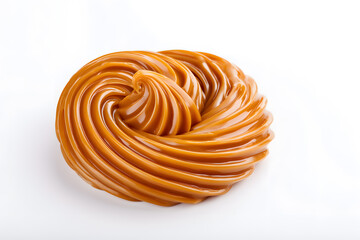 Fototapeta premium Smooth caramel cream swirl isolated on white background. Glossy dessert texture with rich color and soft creamy shape.