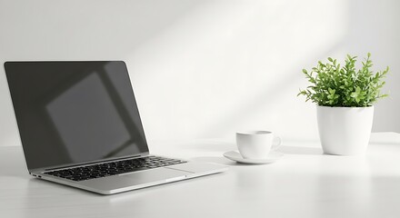 Fototapeta premium A modern laptop and a cup of coffee sit on a wooden table in a green garden office, showcasing mobile technology and business communication on a bright display screen