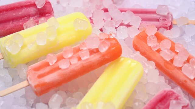 Colorful ice pops in row with slow camera push in close up