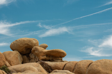 clouds in the sky boulders of orange  © Kate