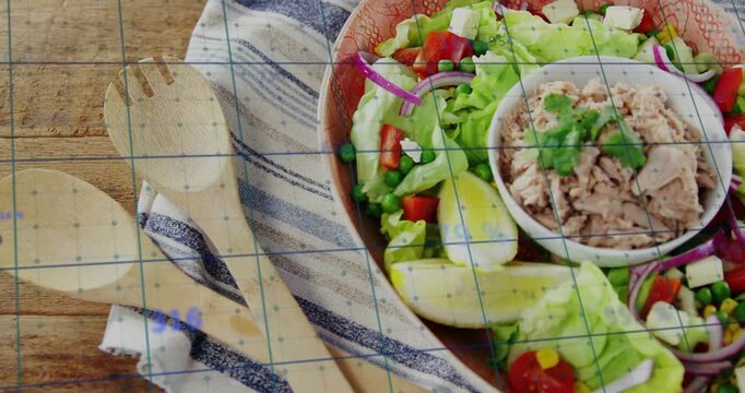 Top cam zooming right, salad bowl showing tuna, grid moving, servers staying left, focusing plating