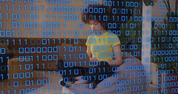 Woman sitting cross-legged on sofa, reacting to offscreen sound, tech binary overlay tracking turns