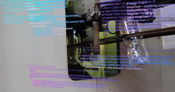 Metal carriage rotating during production, glass bottles swinging off rack, code text scrolling