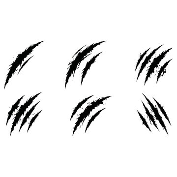 Black vector claw marks illustration set with a fierce and aggressive scratch design for grunge graphics and animal attack concepts