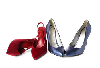Obraz na płótnie Canvas Red and blue high heels on white background