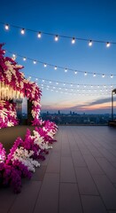 Obraz premium Rooftop terrace decorated with vibrant flowers and string lights at dusk with city skyline view