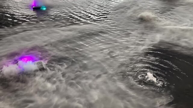 Mini fountain with smoke dry ice decorated in public mall, stock footage