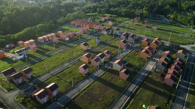 Backward pull-out revealing scale of development at Camella Homes Alfonso Cavite Philippines