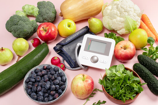 Healthy food and blood pressure monitor, hypertension prevention, DASH diet, heart health, cardiovascular wellness