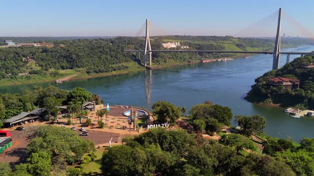 Aerial view of Three Borders Landmark in Puerto Iguazu with Integration Bridge and Parana River.