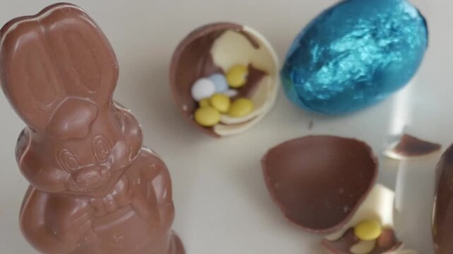 Chocolate bunny and eggs, festive Easter candy delight on a table