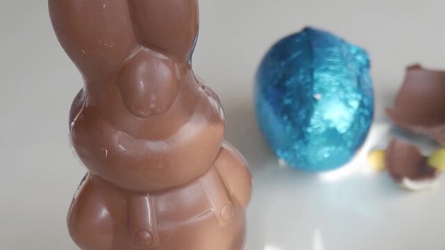 Easter bunny chocolate with colorful eggs, festive and joyful mood