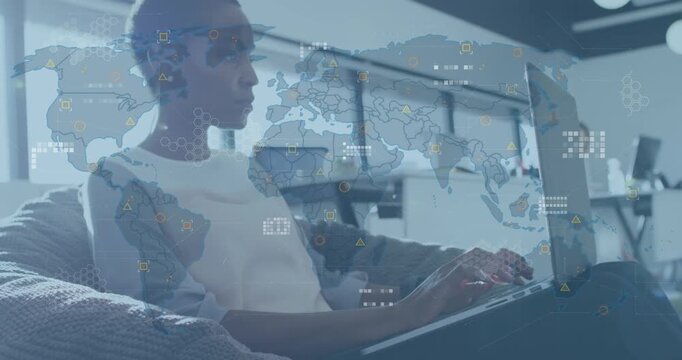 Animation of circuit board pattern and map over thoughtful african american woman working on laptop
