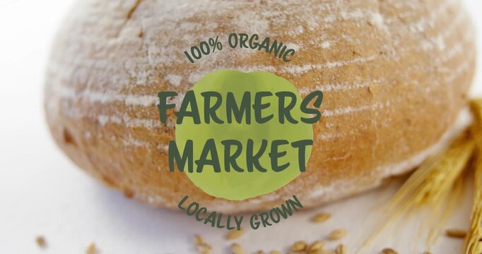 Animation of 100 percent farmers market locally grown text banner against close up of fresh bread