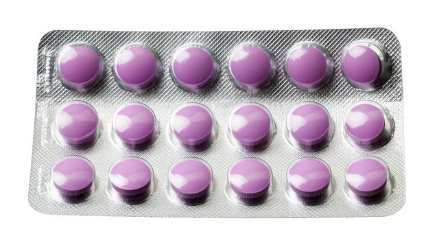 Violet round pills neatly arranged in blister pack, showing medication dosage