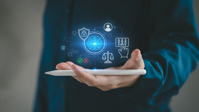 AI governance and human in the loop ethical control concept person holding stylus digital glowing brain scale shield padlock icon artificial intelligence regulation compliance