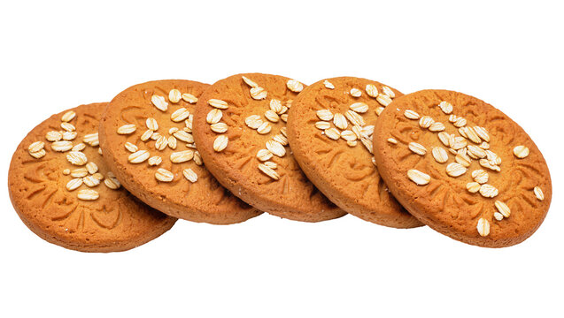 Round oatmeal cookies sprinkled with sesame seeds, arranged in a row