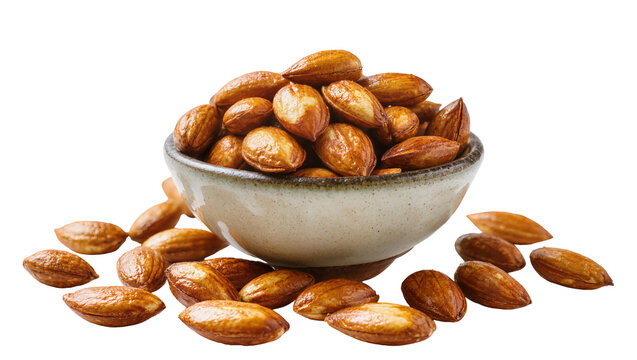 Roasted Marcona Almonds overflowing from rustic ceramic bowl, scattered around