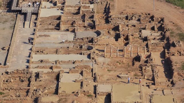 Aerial drone view of Paphos Archaeological Park ruins with stone structures in Paphos, Cyprus
