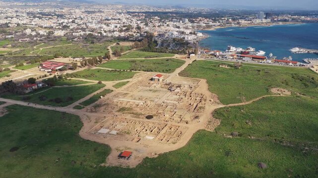 Aerial drone view of Paphos Archaeological Park ancient ruins and excavation site in Paphos, showcasing historical heritage