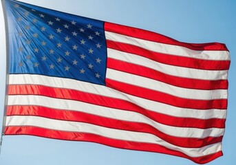 Obraz premium A large american flag waving in the wind