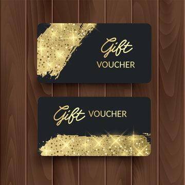 Luxury gift voucher templates with golden glitter elements on a black background. Set of horizontal cards featuring a sparkling glitter bow