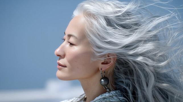 Silent breeze portrait of an elderly woman with silver hair