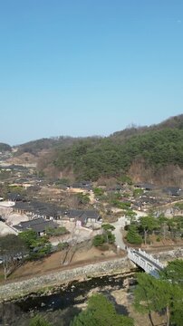 Traditional Korean architecture of Sosu-seowon with pine trees and peaceful landscape