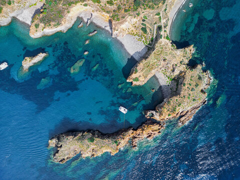 Aerial Top Down View of Rocky Coastline and Clear Blue Sea, Panarea Sicily