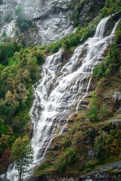 Ri di Cranz&uuml;nasc waterfall cascades through misty Val Bavona, Katon Tessin, Switzerland, ideal for travel