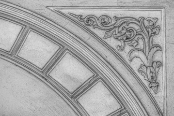 CLASSIC ARCHITECTURE - Ornaments on the facade of a very, very old classicist tenement house