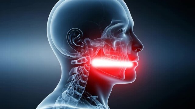 Side view x-ray of human mouth and throat with glowing orange jaw
