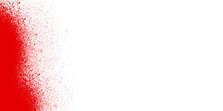 A vibrant red spray paint texture featuring a dense edge that fades into fine scattered particles