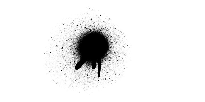 A single dark black circular spray paint splatter with droplets running down the lower edge area