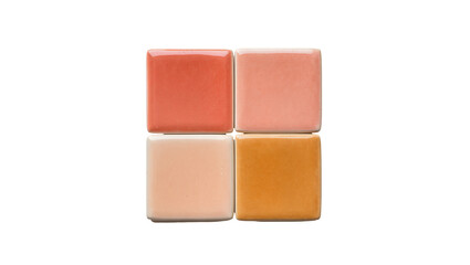 Fototapeta premium Four square ceramic tiles displaying coral salmon peach, and amber hues