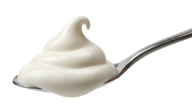 A fresh silver spoonful of sweet white dairy yogurt cream isolated on a healthy dessert plate with milk ingredients