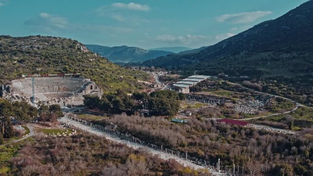 Aerial view of ancient marble street, Roman ruins and stone structures in Ephesus, Izmir, Turkey. Archaeological remains, columns and historic architecture reveal the scale of the ancient city.