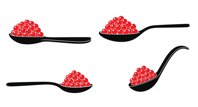 Red caviar displayed on black spoons a striking visual silhouette
