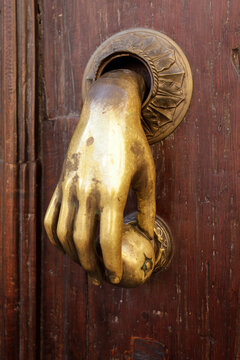 Antique Hand Shaped Door Knocker on Wooden Door Vintage Detail