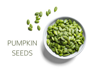 Pumpkin seeds in bowl isolated