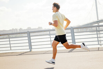 Running along the riverside in a sunny afternoon with a refreshing breeze